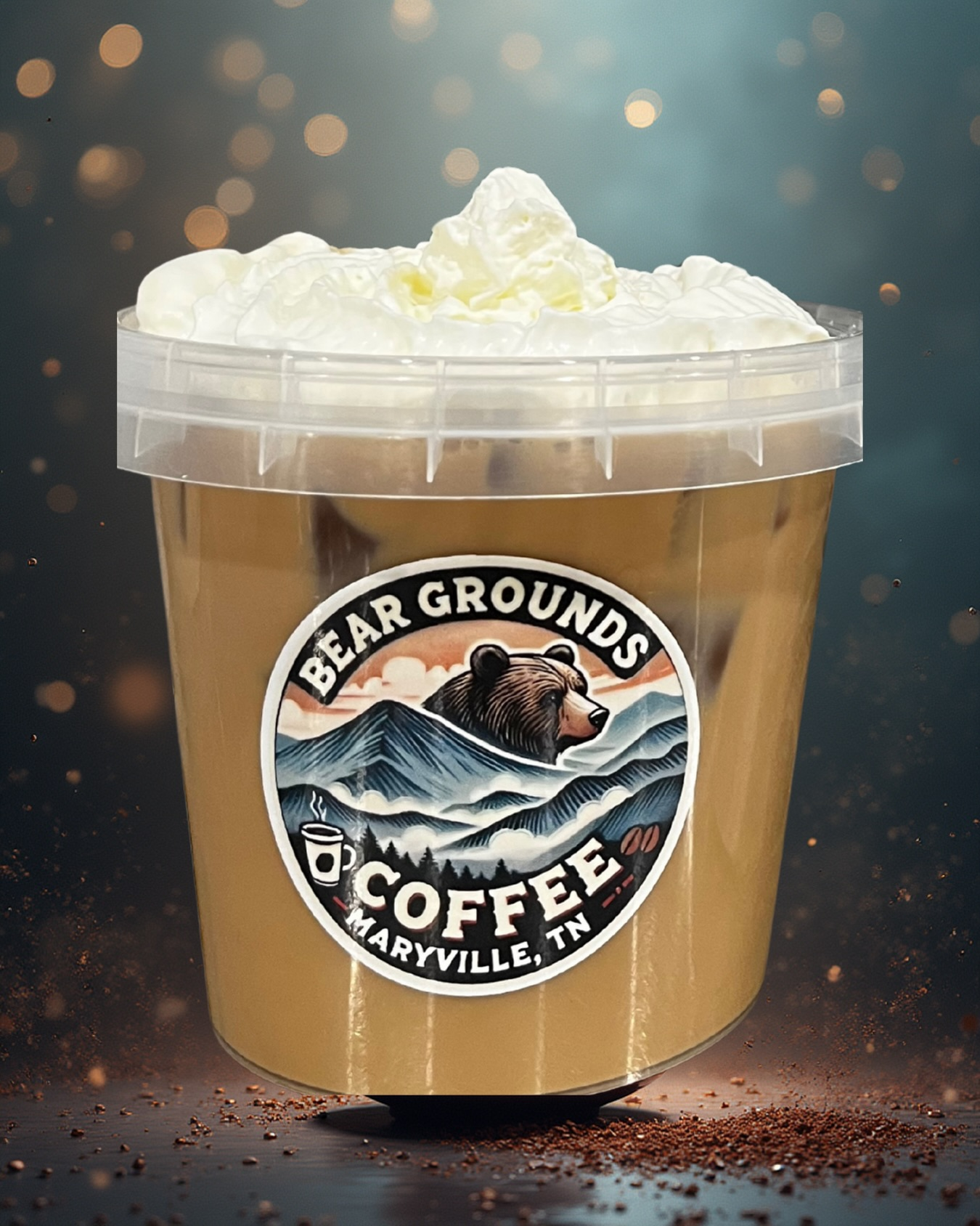 Iced Bear Grounds coffee drink with whipped cream and branded cup